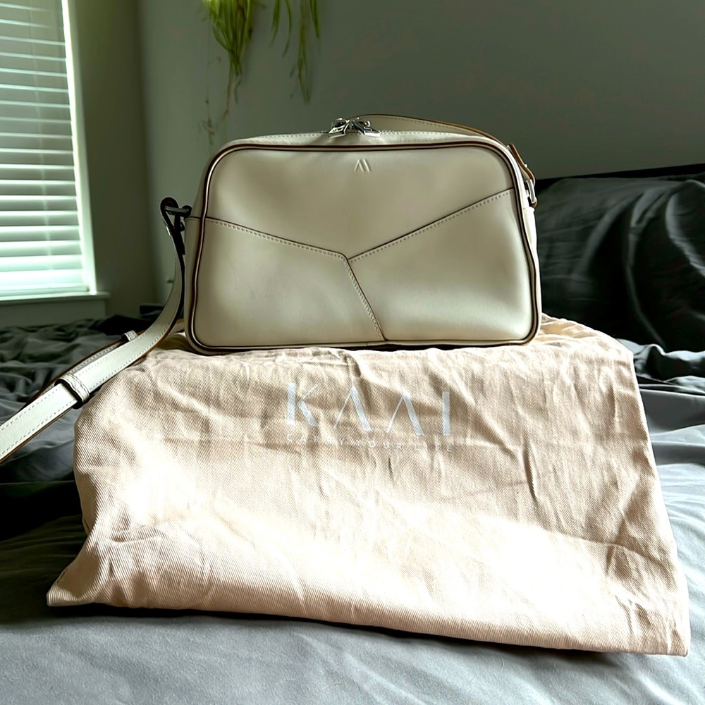 Gently used KAAI Mini Bowler in Bleached Sand